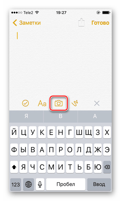 Нажатие на значок создания фотографии в приложении Заметки на iPhone